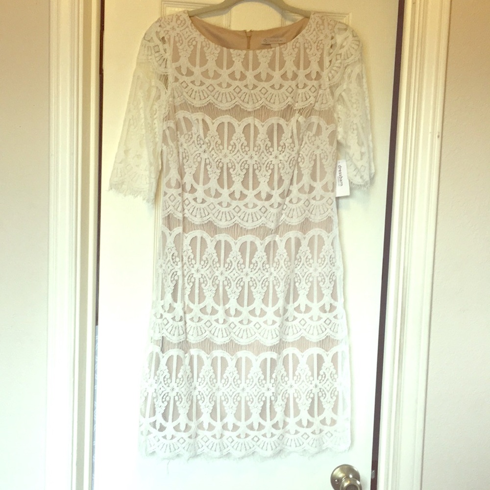 White lace dress established 1962